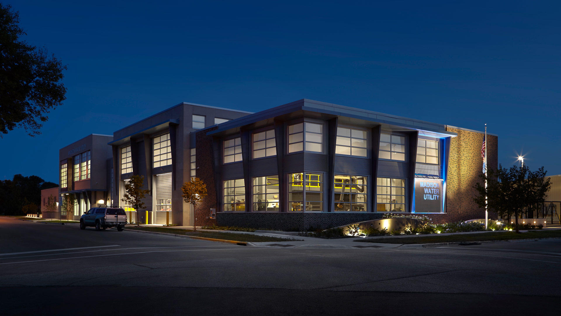 Madison Water Utility at night, illuminated signage